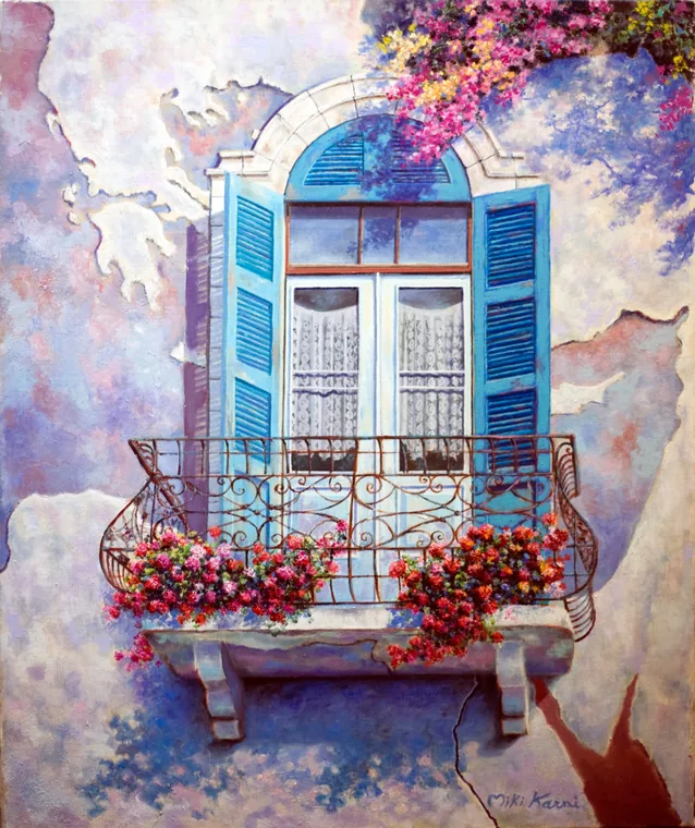 Blue-shuttered Mediterranean balcony filled with flowers.